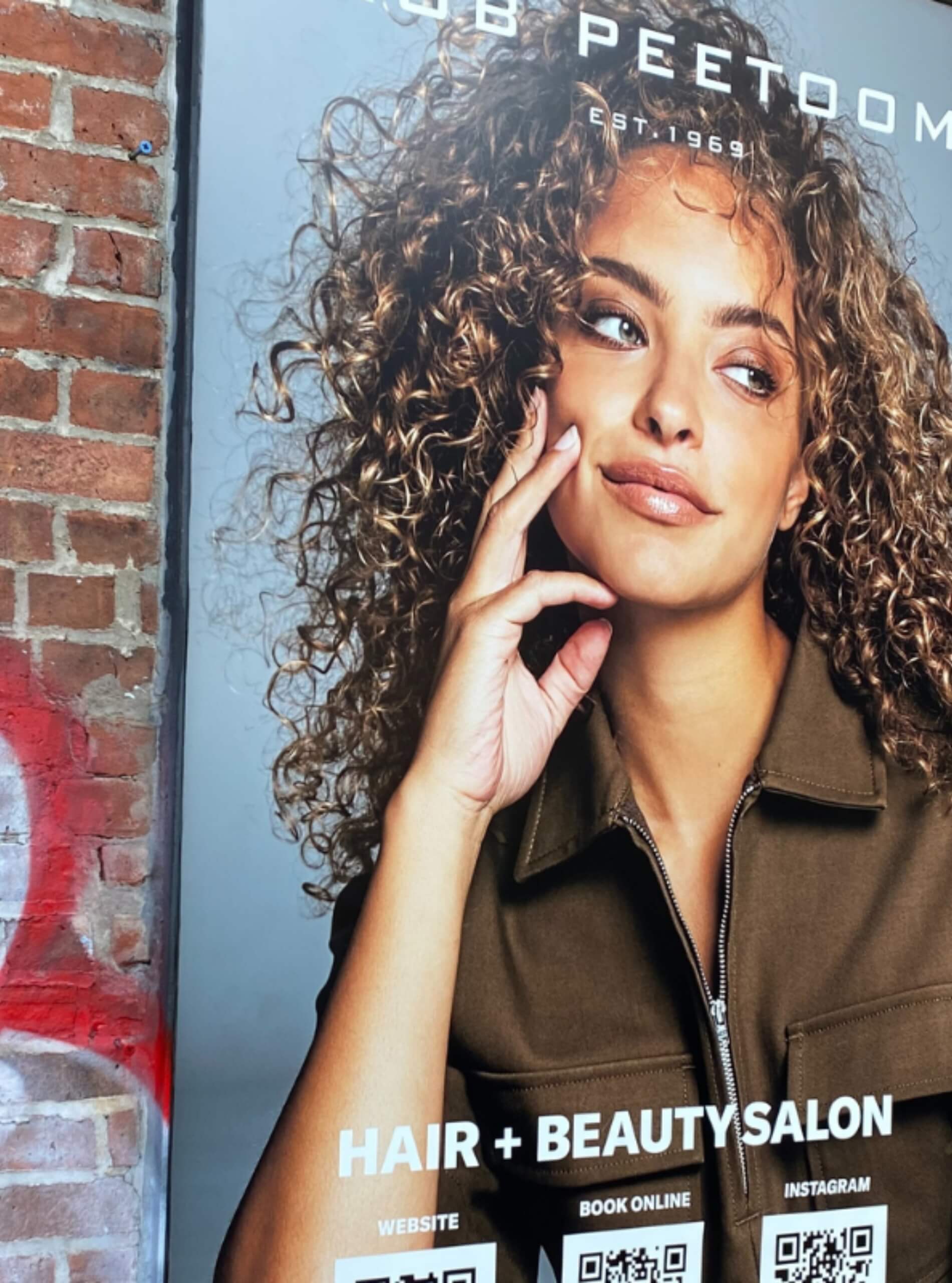 Hair salon window advertising wrap